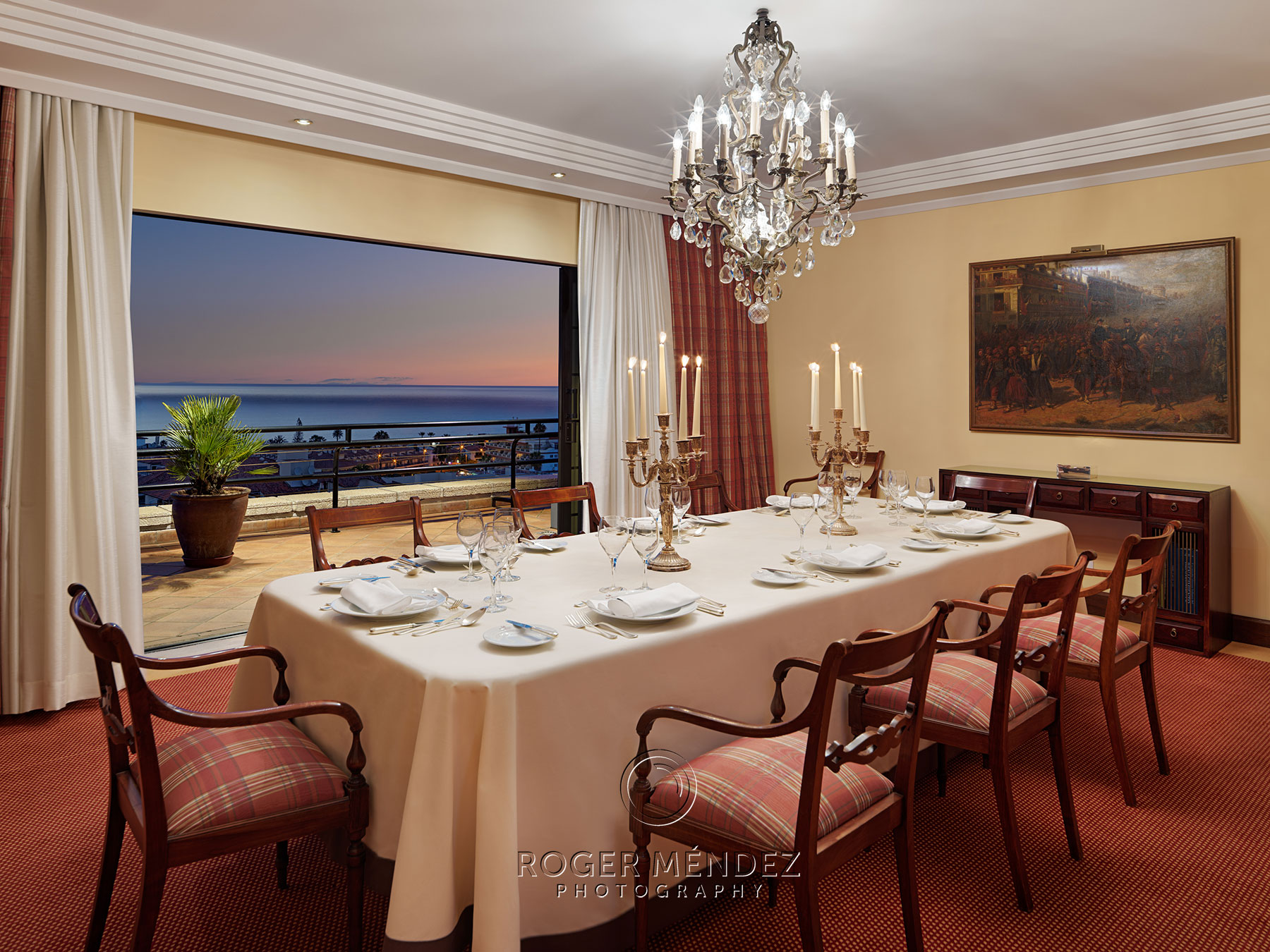 Dining room with dinner set-up of the presidential suite