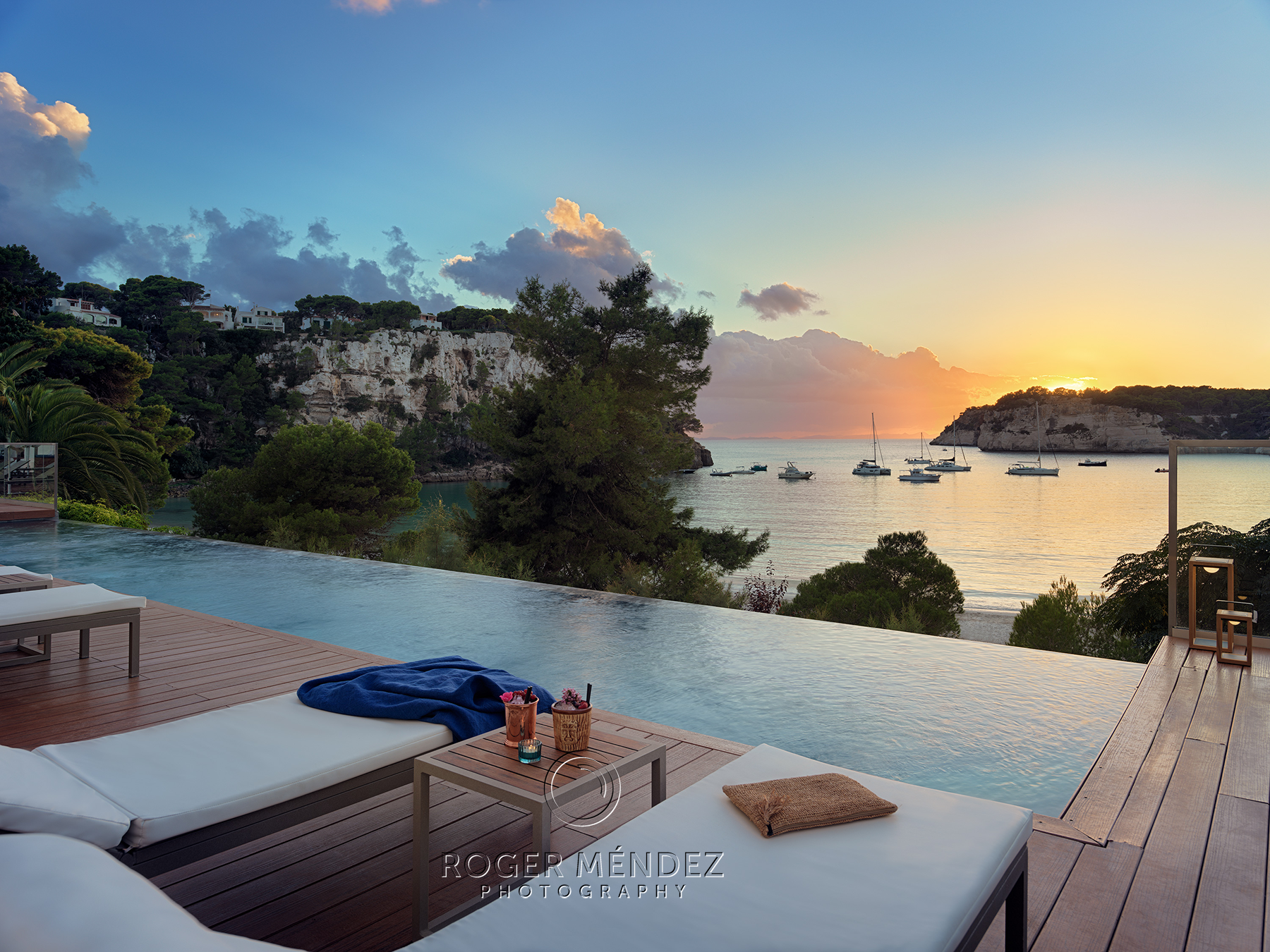 Infinity pool at sunset Melia Cala Galdana hotel